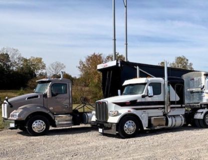 Two Ditzfeld CDL-A driver trucks in a parking lot