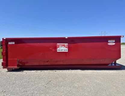 A 30 yard Ditzfeld container in a gravel lot